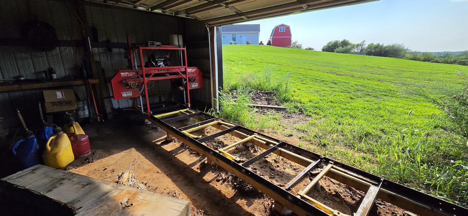 Sawmill track used for custom milling long logs in Indianola, Iowa