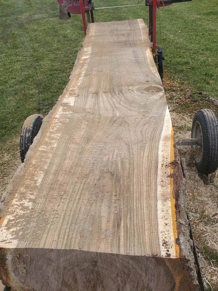 Log milling in progress at Indianola Sawmill