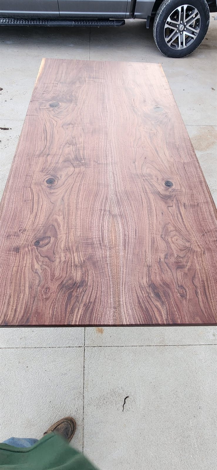 Bookmatched black walnut table top with mirrored grain