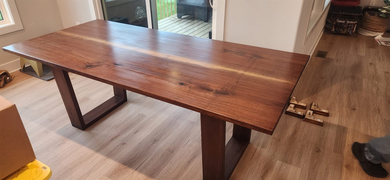 Black walnut live edge dining table built by Indianola Sawmill
